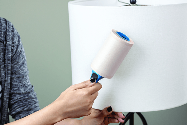 Lint Roller Cleaning Up Lamp Shade